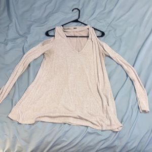 Long sleeve key hole shoulders and a choker collar.